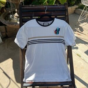 White shirt with stripes with butterfly patch and flower of life with chakras